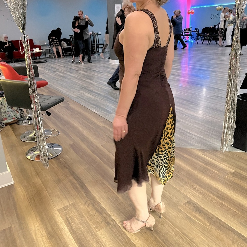 Tango dress size 10 but fits tight like a size 8.